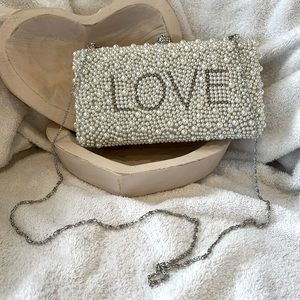 LOVE PEARL CLUTCH WITH SILVER STRAP